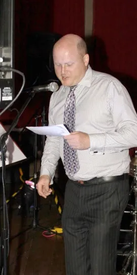 Edward Simpson doing some announcements at an event