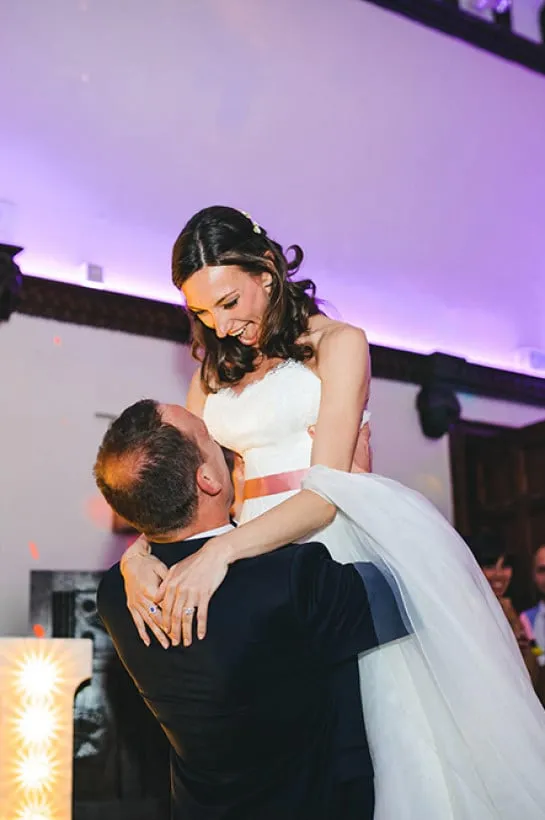 First dance of the married wedding couple in the Great Hall. The led lighting changing colour with the music beats.