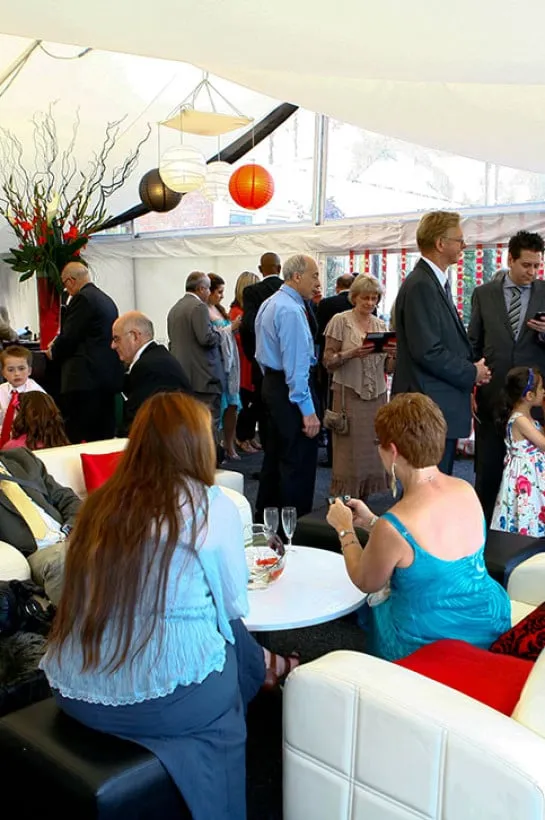 A bespoke bar area set up in a marquee for a wedding reception.